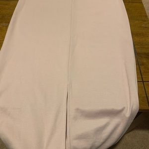 Blush pink pencil skirt never worn, spandex, listed as XL and runs small